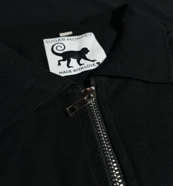 Bold Black Pique Semi-Zip Polo